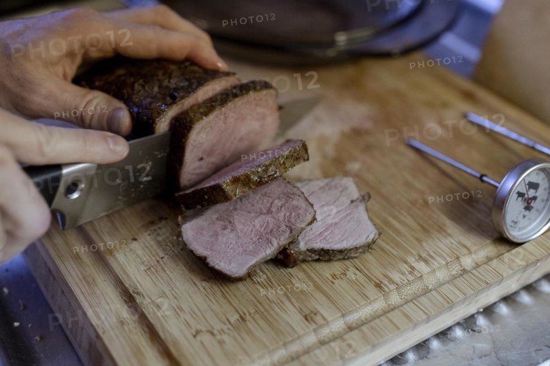 Beef roast is cut into pieces