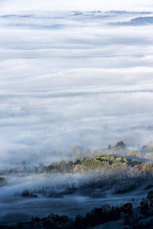 View from the Zeller Horn on misty landscape of the Swabian Alb