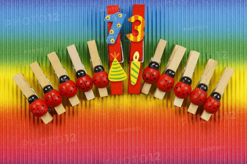 Clothes pegs and number 13