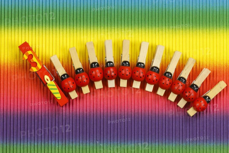 Clothes pegs and number 3