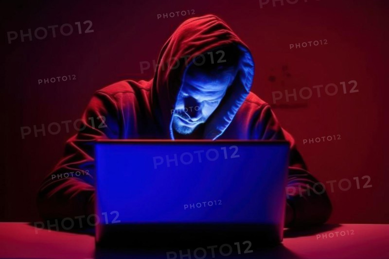 A man in his early 40s with a hoodie