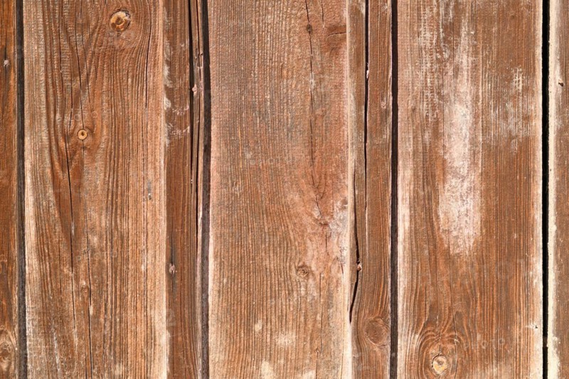 Wooden background with brown colored planks