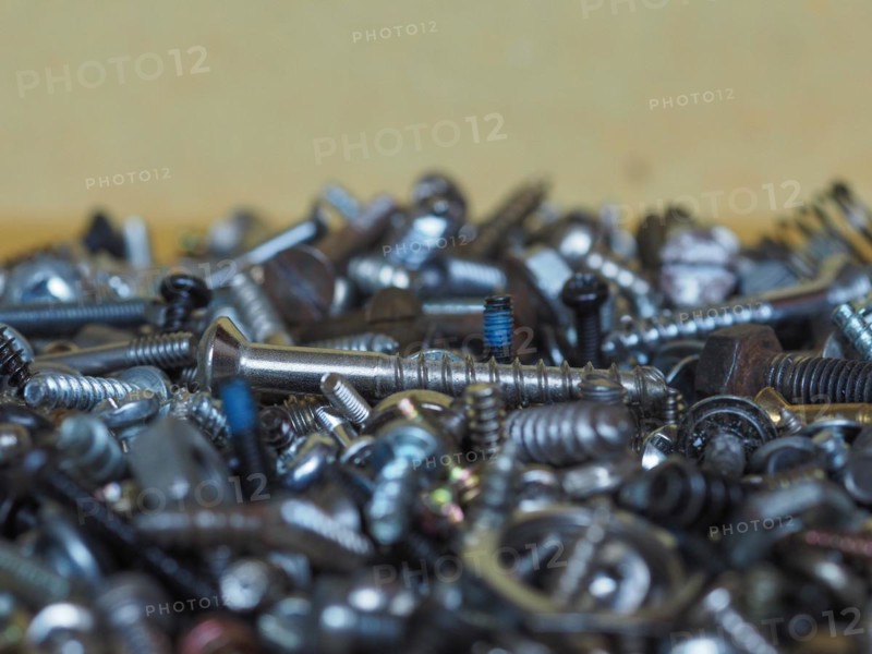 Industrial steel hardware bolt nut screw washer background