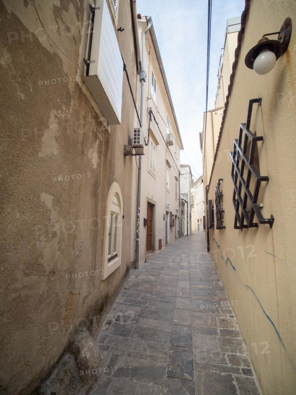Mediterranean old town with old alleys and houses in the morning