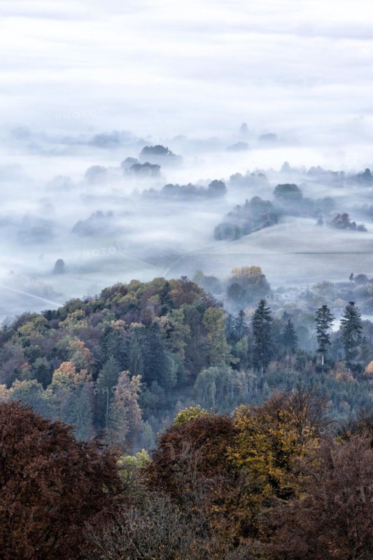View from the Zeller Horn on misty landscape of the Swabian Alb