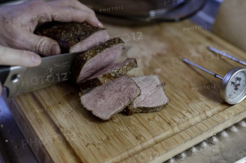 Beef roast is cut into pieces