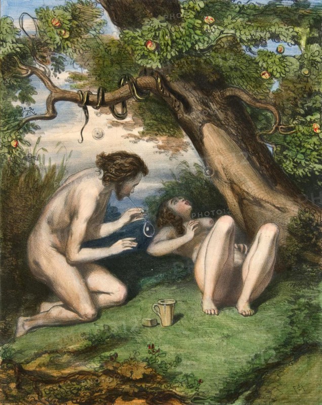Naked young couple lying under a tree