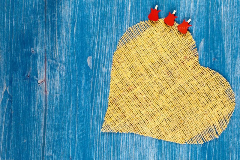 Linen heart on blue background
