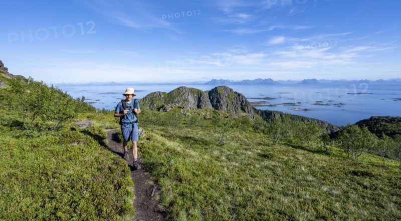 Hikers on trail to Dronningsvarden or Stortinden
