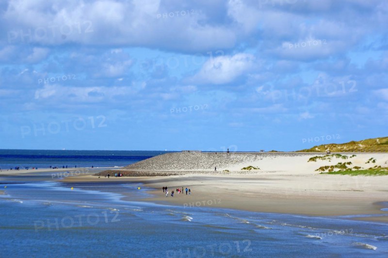 Wide sandy beach with few people