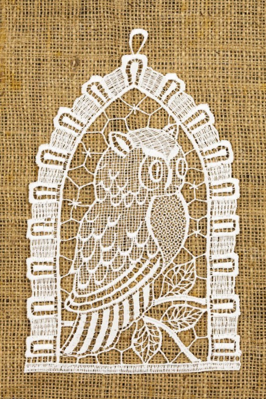Crocheted Owl on Linen Background
