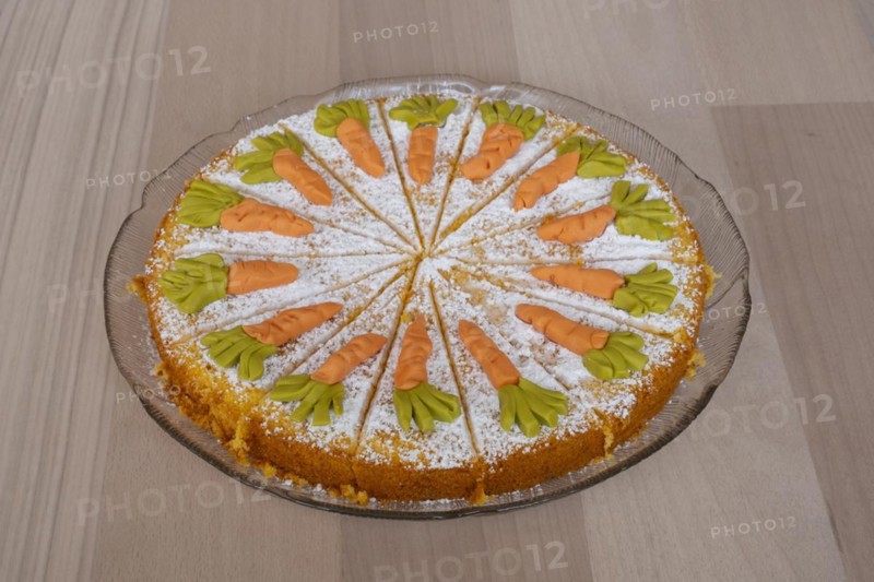Homemade carrot cake on a glass plate