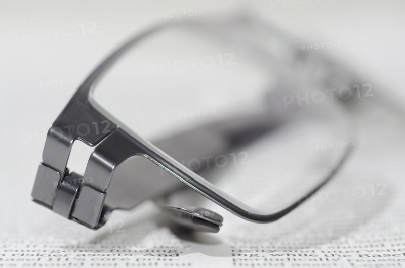 Financial Newspaper and Eyeglasses
