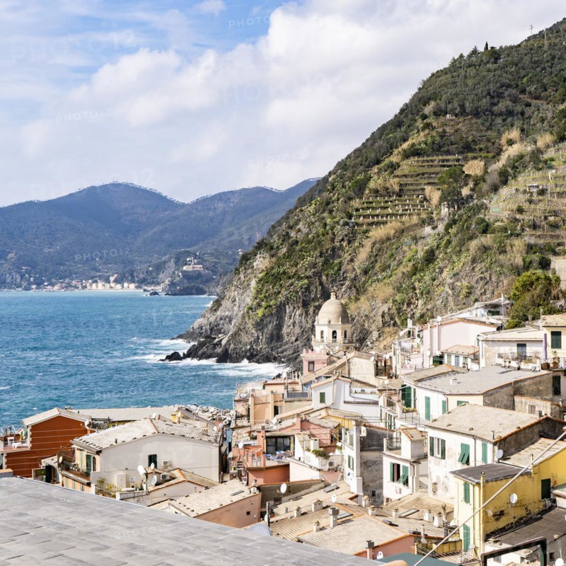 Scenic view of ocean and Vernazza village located in Cinque Terre