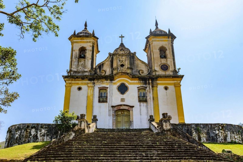 Ancient stairs and historic church of 18th century colonial architecture on top of the hill in the city of Ouro Preto in Minas Gerais