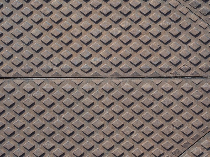 Steel diamond plate useful as a background
