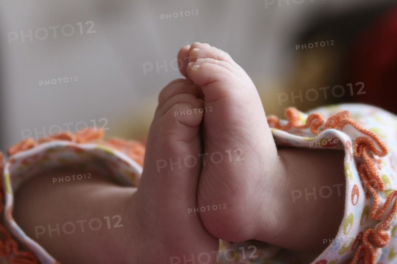 Close-up of two baby feet of a newborn child
