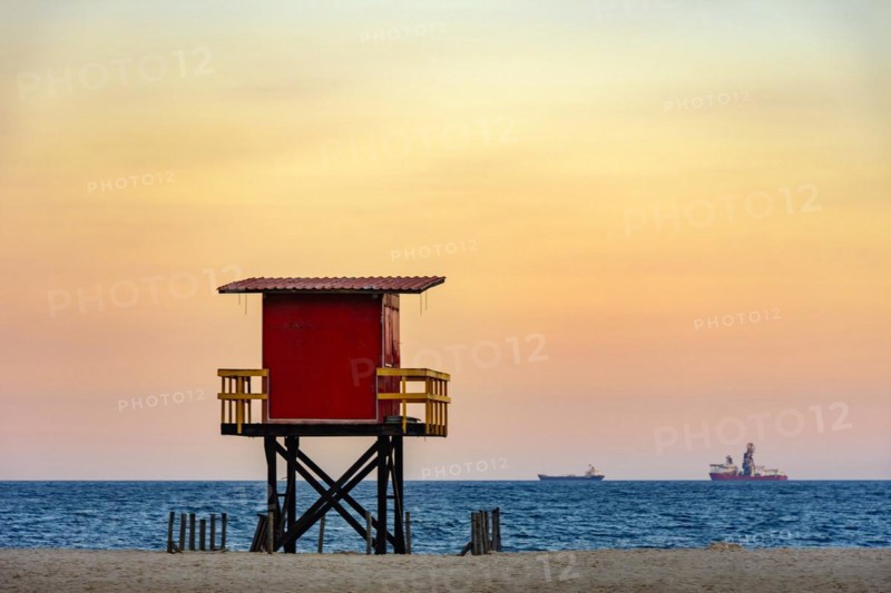 Rescue cabin on Copacabana beach at a tropical sunset on Rio de Janeiro city