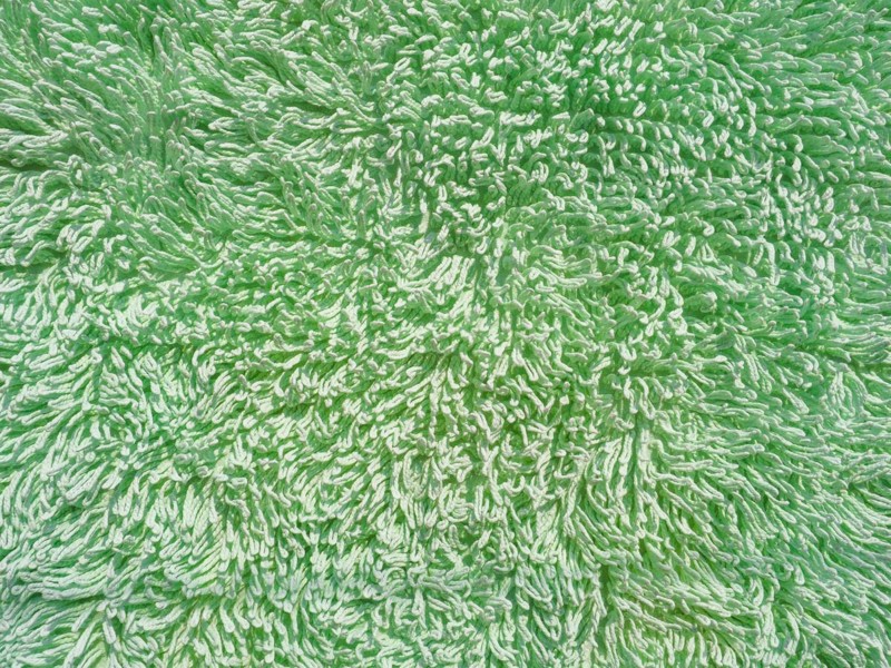 Green carpet texture background