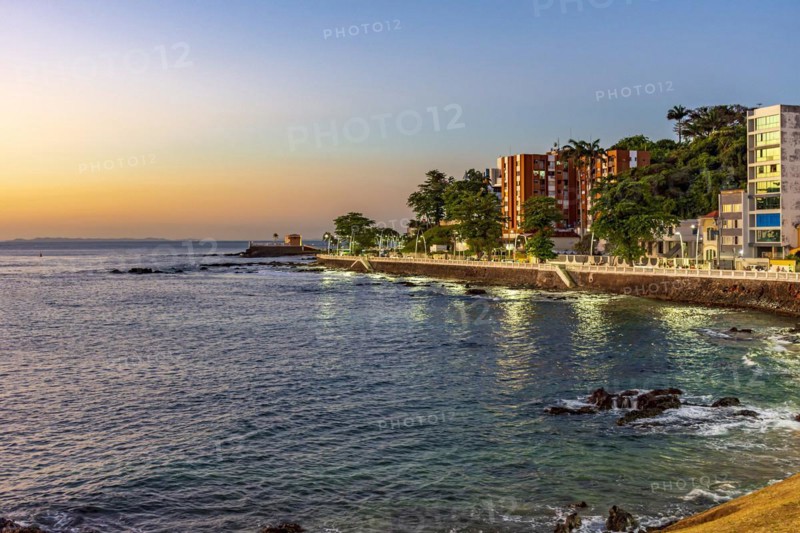 Seafront in the tourist region of the city of Salvador in Bahia during sunset with the sea
