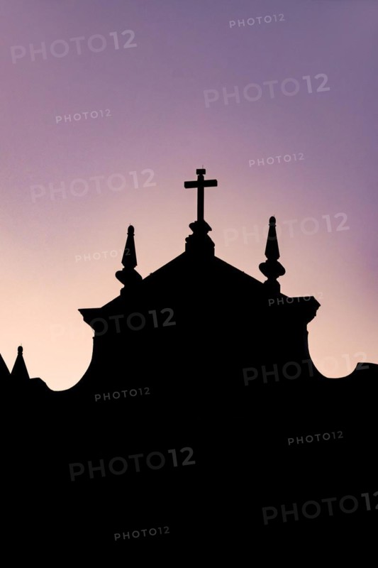 Silhouette of a colonial-style historic church during sunset in the Pelourinho neighborhood in the city of Salvador