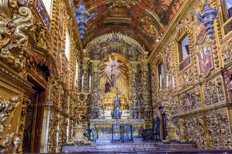 Interior and altar of a brazilian historic ancient church from the 18th century in baroque architecture with details of the walls in gold leaf in the city of rio de Janeiro