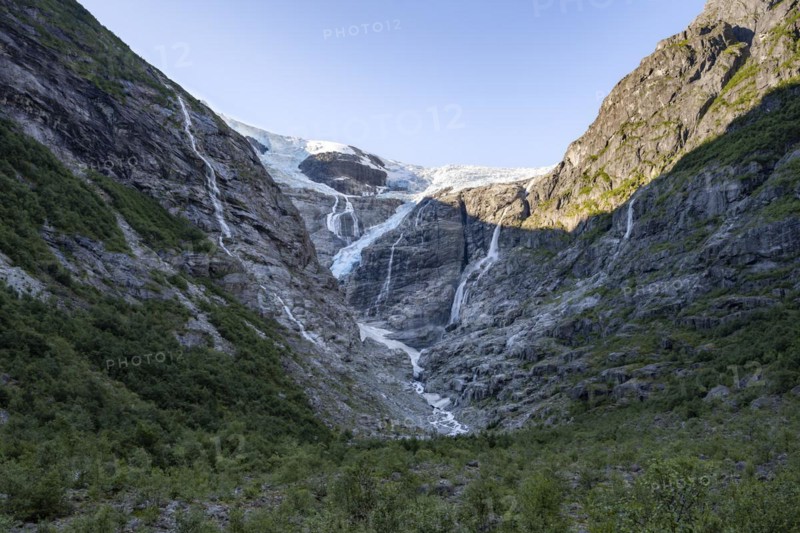 Waterfalls at the glacier tongue Kjenndalsbreen