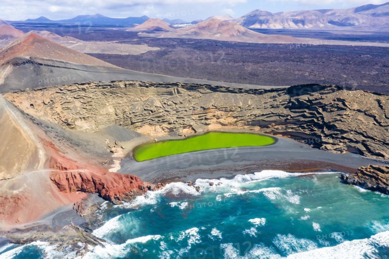 Green lake Charco de Los Clicos Verde near El Golfo in the Canary Islands Aerial view on the island of Lanzarote
