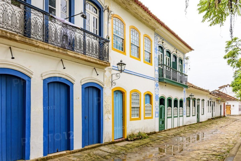 Old houses facades in colonial style on the streets of the old and historic city of Paraty founded in the 17th century on the coast of the state of Rio de Janeiro