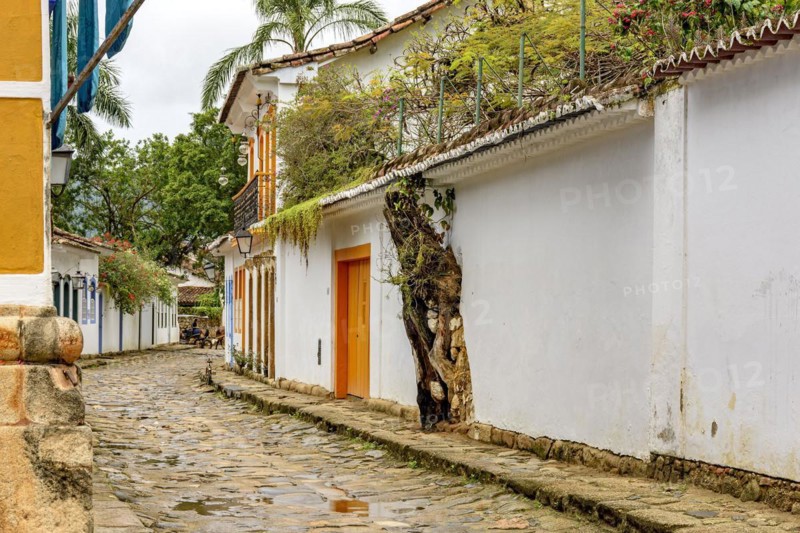 Streets of cobblestone and old houses in colonial style on the streets of the old and historic city of Paraty founded in the 17th century on the coast of the state of Rio de Janeiro