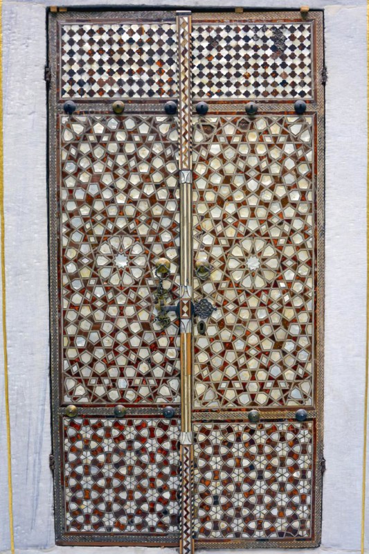 Portal with wood and mother-of-pearl mosaic inside the ancient and famous Topkapi Palace in Istanbul