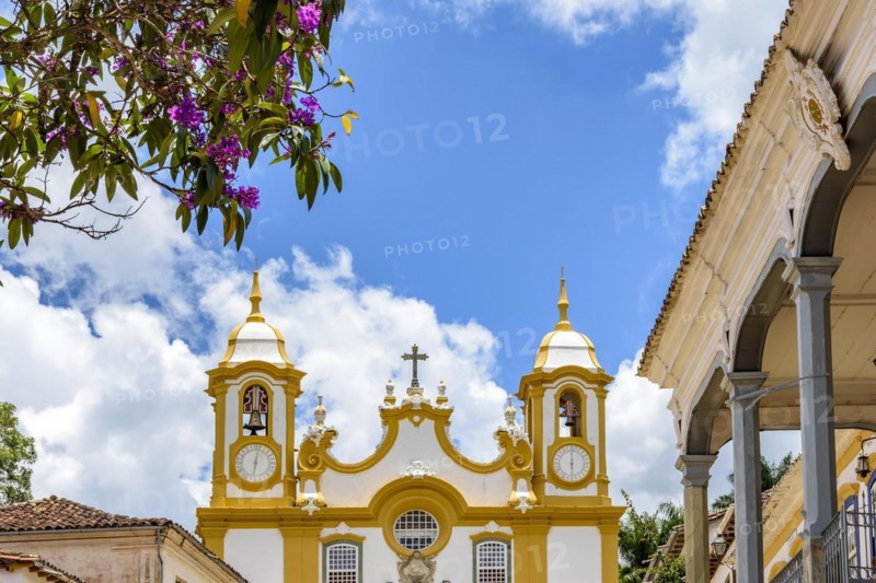 Historic baroque church tower with bell and clock in the old city of Tiradentes in Minas Gerais state