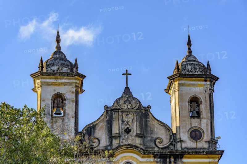 Baroque style historic church towers with their bells in Ouro Preto