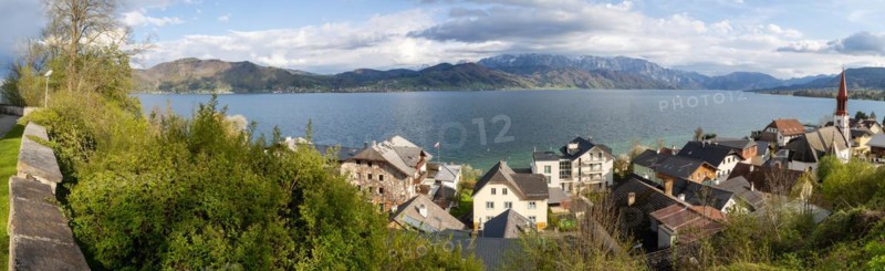 View over the village Attersee am Attersee and the evangnlical church to the lake Attersee