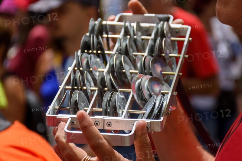 Metal rattle during street carnival festivities in Brazil
