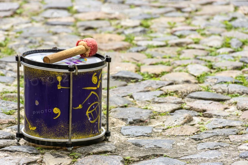 Small drum decorated on the cobblestones of the Pelourinho slopes in Salvador