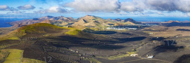 Panorama at sunrise from the Montana de Guardilama to the wine-growing area La Geria