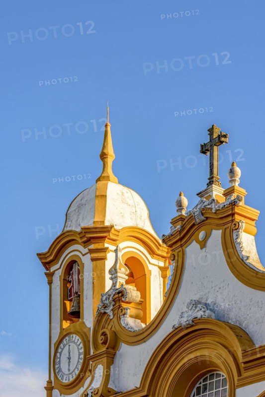 Historic church tower with bell and clock in the famous city of Tiradentes in Minas Gerais
