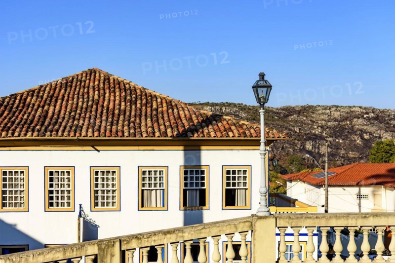 Facade of colorful colonial houses in the historic city of Diamantina in Minas Gerais with the mountain in the background