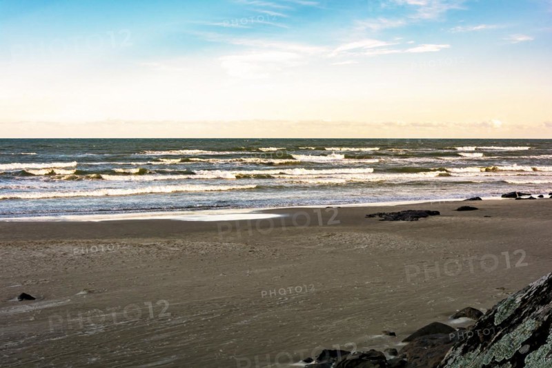 Beach in the city of Torres on the coast of the state of Rio Grande do Sul in Brazil during sunset