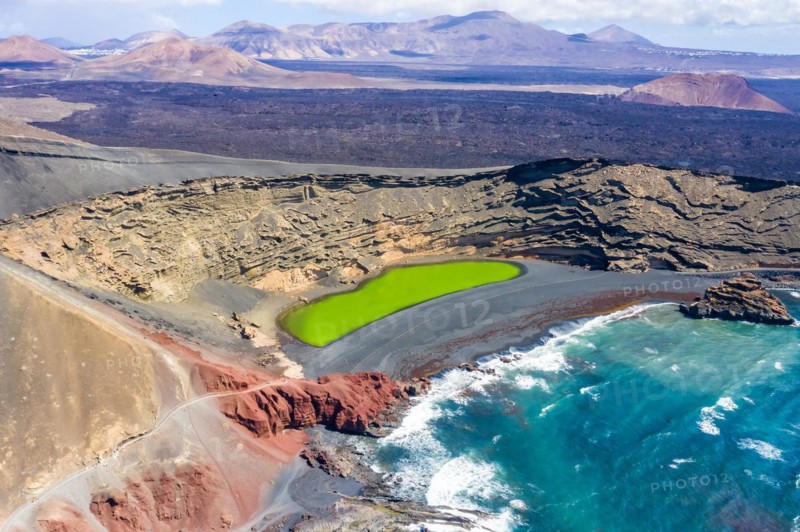 Green lake Charco de Los Clicos Verde near El Golfo in the Canary Islands Aerial view on the island of Lanzarote