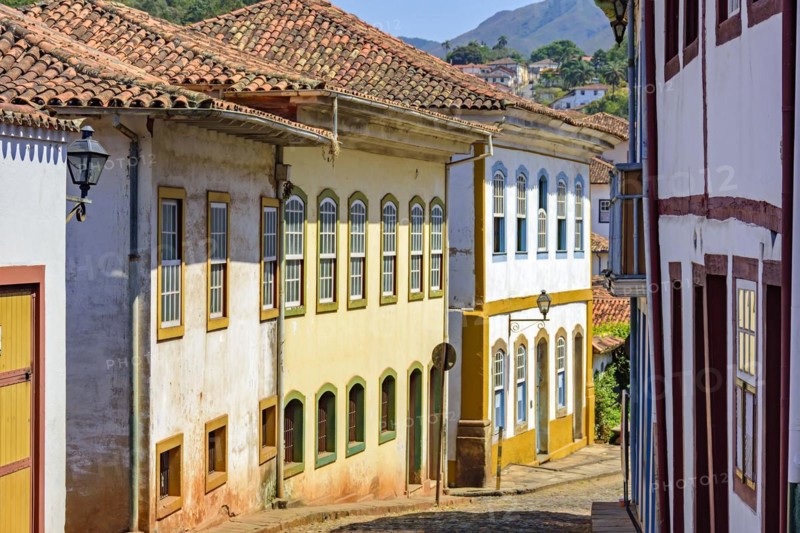 Quiet street with old colorful houses in colonial architecture