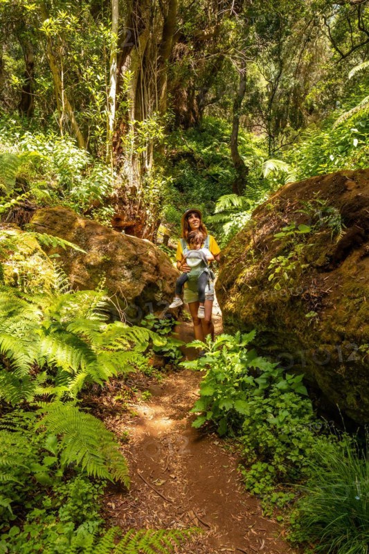 A young woman trekking on a path in La Llania on El Hierro