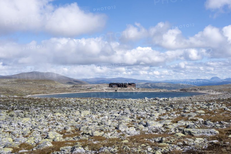 Snoheim mountain hut by a mountain lake
