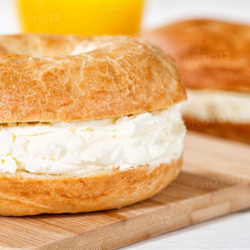 Bagel sandwich for breakfast topped with cream cheese close-up square in Stuttgart