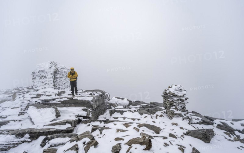 Climbers at the top of Snohetta Mountain