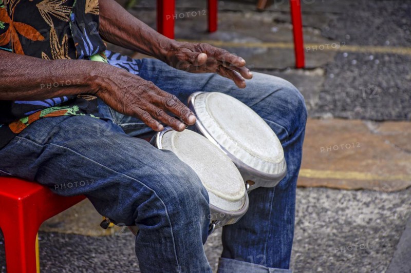 Percussionist playing bongo in the streets of historic Pelourinho district in Salvador