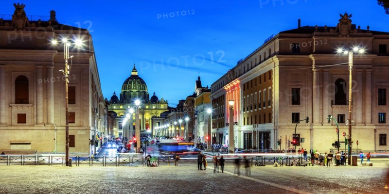 Street scene on Via della Conciliazione to St. Peter's Basilica in the evening light