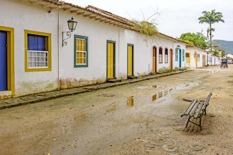 Sand street and old houses in colonial style on the streets of the old and historic city of Paraty founded in the 17th century on the coast of the state of Rio de Janeiro
