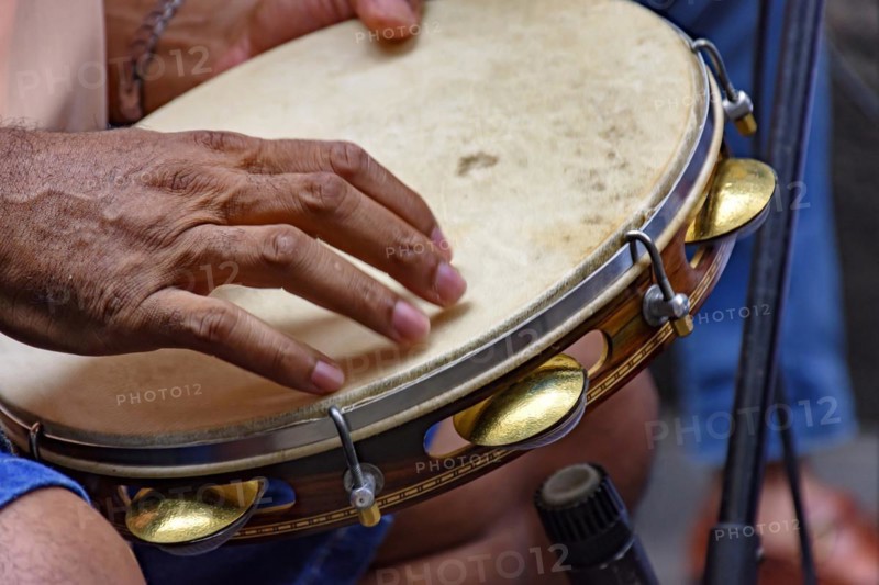 Tambourine being played by a ritimist during a samba performance in Rio de Janeiro